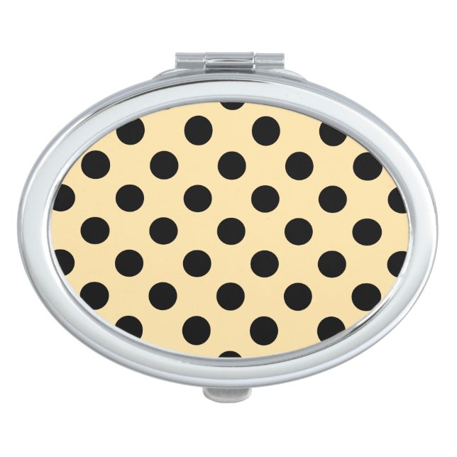 Black polka dots on pale yellow vanity mirror (Front)