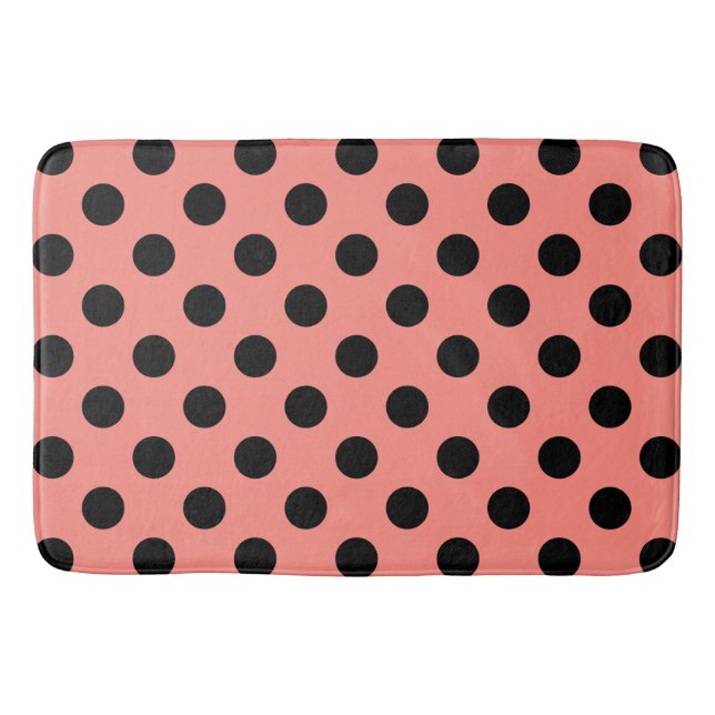 Black polka dots on peach bathroom mat (Front)