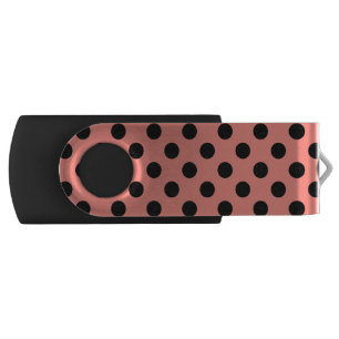 Black polka dots on peach flash drive