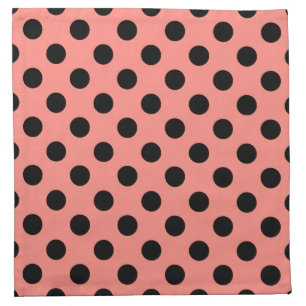 Black polka dots on peach napkin