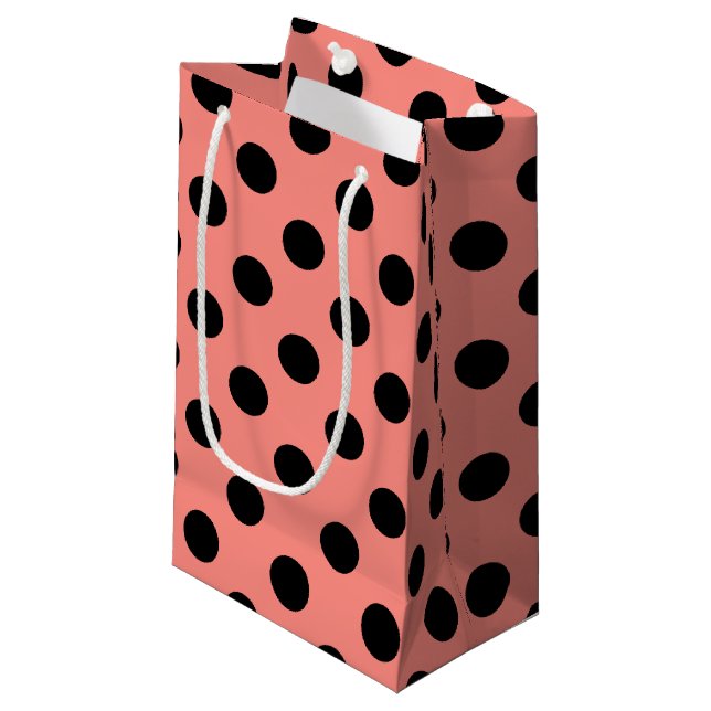 Black polka dots on peach small gift bag (Front Angled)