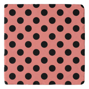 Black polka dots on peach trivet
