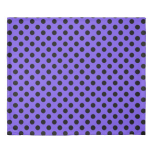 Black polka dots on periwinkle duvet cover