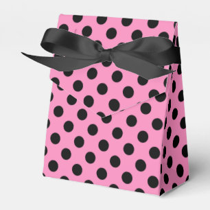 Black polka dots on pink favor boxes