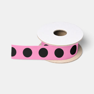 Black polka dots on pink satin ribbon