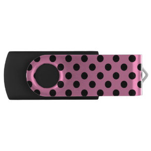 Black polka dots on pink USB flash drive