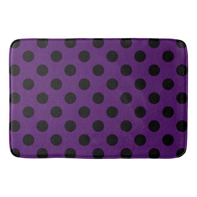 Black polka dots on plum purple bathroom mat (Front)