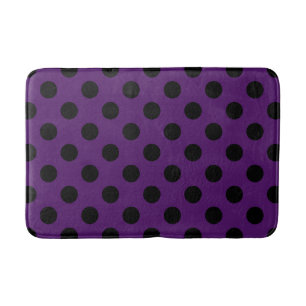 Black polka dots on plum purple bathroom mat