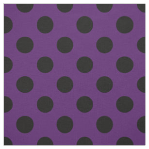 Black polka dots on plum purple fabric