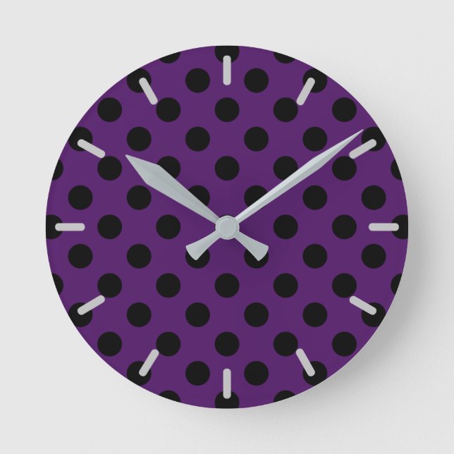 Black polka dots on plum purple round clock (Front)