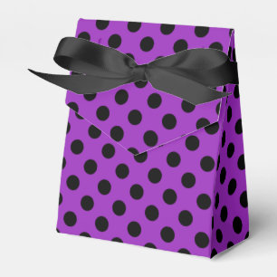 Black polka dots on purple favor boxes