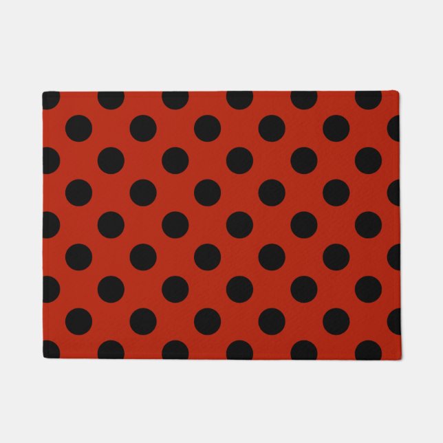 Black polka dots on red doormat (Front)