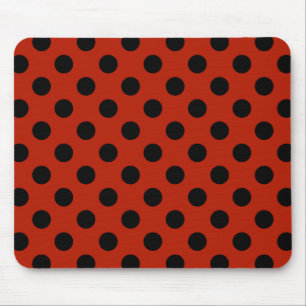 Black polka dots on red mouse pad