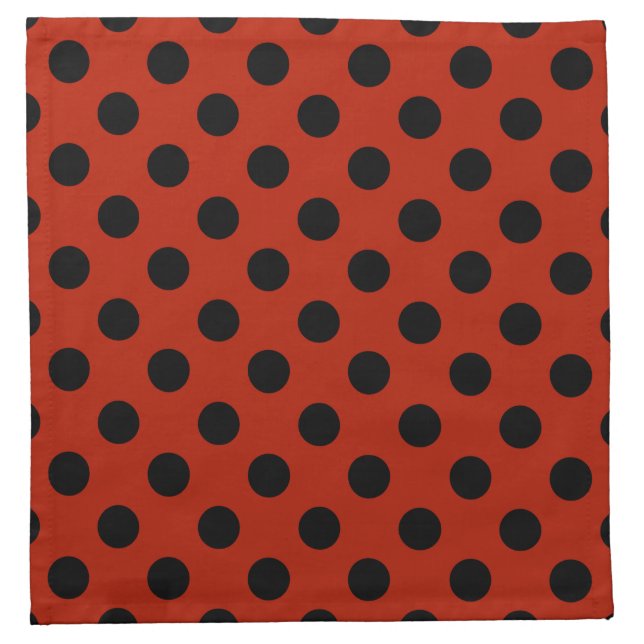 Black polka dots on red napkin (Front)