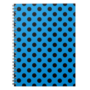 Black polka dots on sky blue notebook