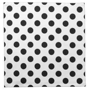 Black polka dots on white napkin