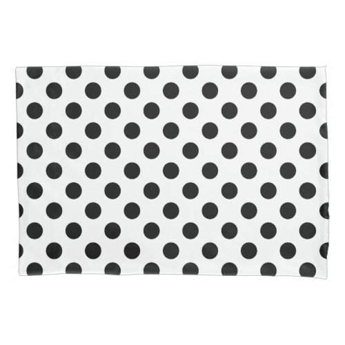 Black polka dots on white pillowcase