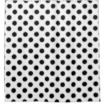 Black polka dots on white shower curtain