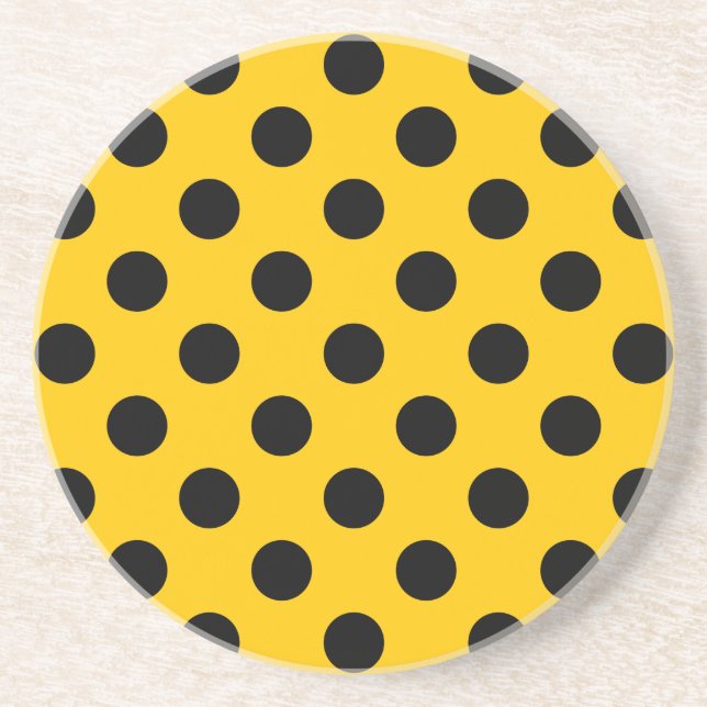 Black polka dots on yellow sandstone coaster (Front)