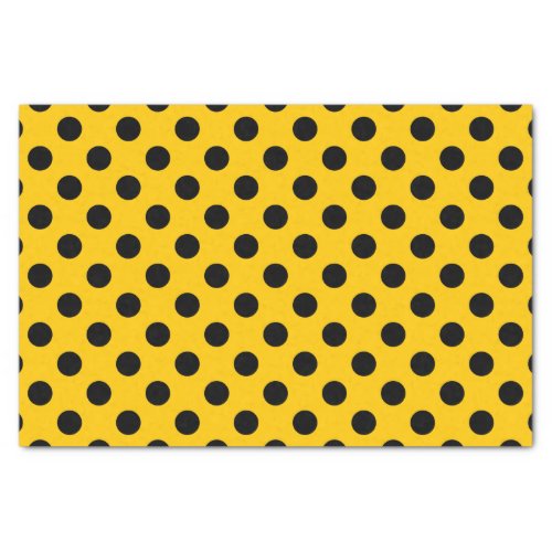 Black polka dots on yellow tissue paper