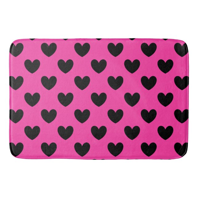 Black polka hearts on fuchsia pink bath mat (Front)