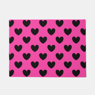 Black polka hearts on fuchsia pink doormat