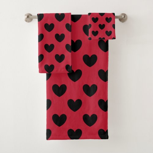 Black polka hearts on red bath towel set