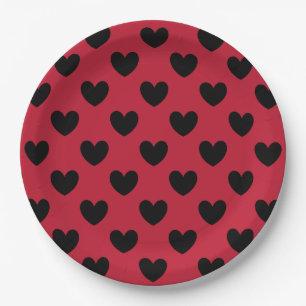 Black polka hearts on red paper plates