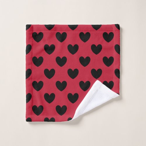 Black polka hearts on red wash cloth