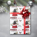 Black Pomeranian Dog in Christmas Gift Bag Wrapping Paper<br><div class="desc">The repeated pattern on this cute Christmas wrapping paper is an image of a black Pomeranian dog peeking out from a red and white Holiday gift bag. Behind him is a sprig of holly and red berries. A red and black bullfinch bird is about to land. Stylized red and black...</div>