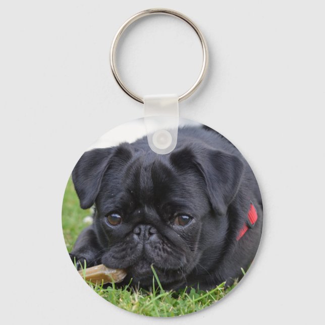black pug laying keychain (Front)