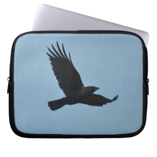 Black Raven Flying in Blue Sky Photo Laptop Sleeve
