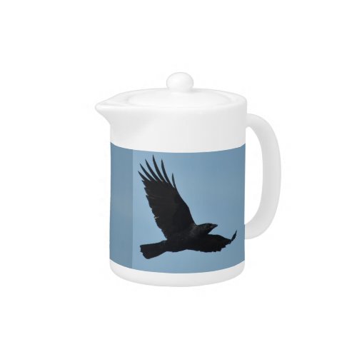 Black Raven Flying in Blue Sky Photo Teapot
