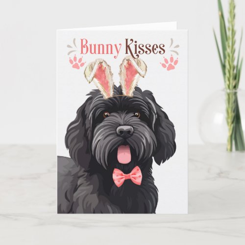 Black Russian Terrier Dog in Bunny Ears for Easter Holiday Card