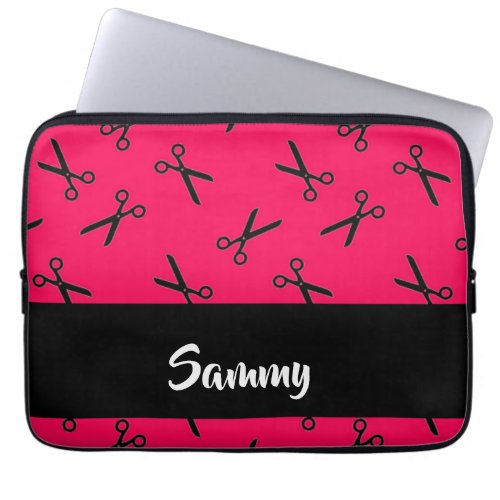 Black scissors silhouette on pink laptop sleeve