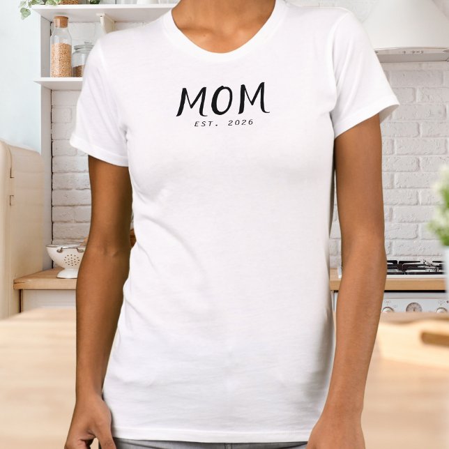 Black Script Established Mom T-Shirt (A white t-shirt with "Mom Est. 2026" design in black lettering)