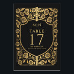 Black Shield Medieval Fantasy Monogram Wedding  Table Number<br><div class="desc">Celebrate with this Royal Sword & Shield Medieval Fantasy Monogram design. This design is perfect for couples seeking a regal yet modern medieval fantasy esthetic. PLEASE NOTE: The gold featured in this design NOT real foil. Items are printed exactly as they appear on your screen when you add to the...</div>