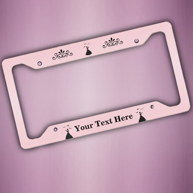 Black Silhouette Lady Ruffled Dress Doves Pink License Plate Frame (Lady in black silhouette ruffled dress fancy doves, ornate scrolls on light pink license plate frame)