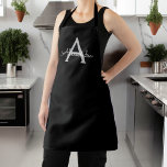 Black Silver Modern Script Girly Monogram Name Apron<br><div class="desc">Black and Silver Monogram Name Apron. This makes the perfect sweet 16 birthday,  wedding,  bridal shower,  anniversary,  baby shower or bachelorette party gift for someone that loves glam luxury and chic styles.</div>