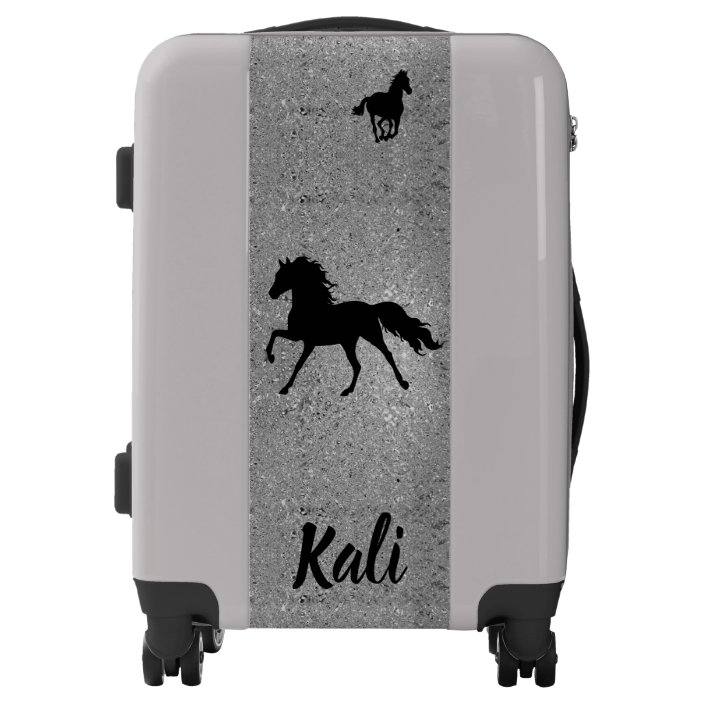 luggage with horses on it