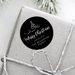 Black Silver Ribbon Tree Merry Christmas Script Classic Round Sticker<br><div class="desc">This modern holiday sticker features a silver faux foil ribbon Christmas tree and the words "Merry Christmas" in stylish silver gray calligraphy script on a black background. Personalize it with your family's name in serif font.</div>