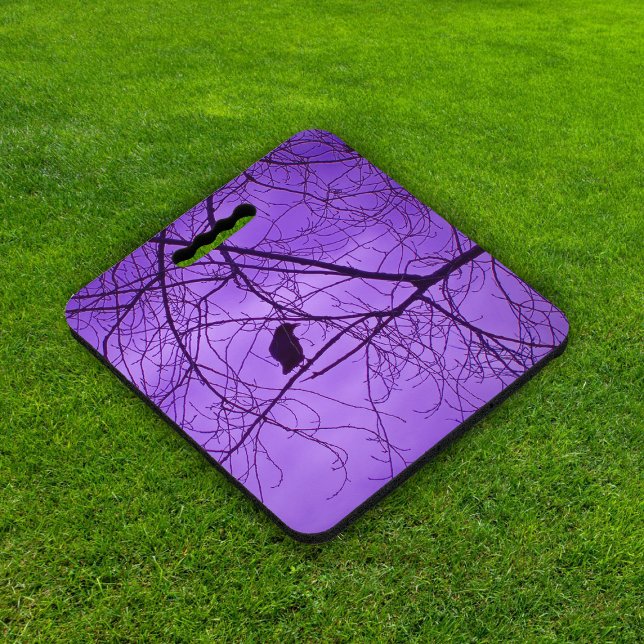 Black single crow in barren Trees hazy Purple Sky Seat Cushion (Single black crow silhouette in black tree branches on hazy purple sky kneeling or seat cushion.)