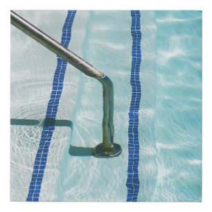 Black strap on blue swimming pool faux canvas print