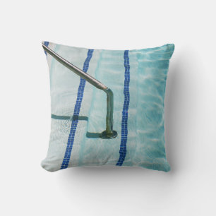 Black strap on blue swimming pool throw pillow