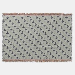 Black swans throw blanket