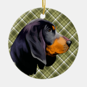 BLACK & TAN COONHOUND WITH GREEN PLAID PATTERN CERAMIC ORNAMENT