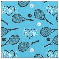 Black tennis rackets on blue fabric