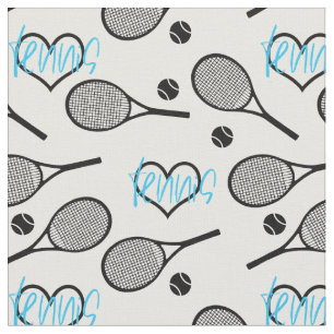 Black tennis rackets on white fabric