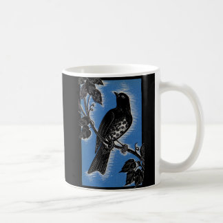 black thrush with blue coffee mug