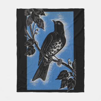 black thrush with blue fleece blanket